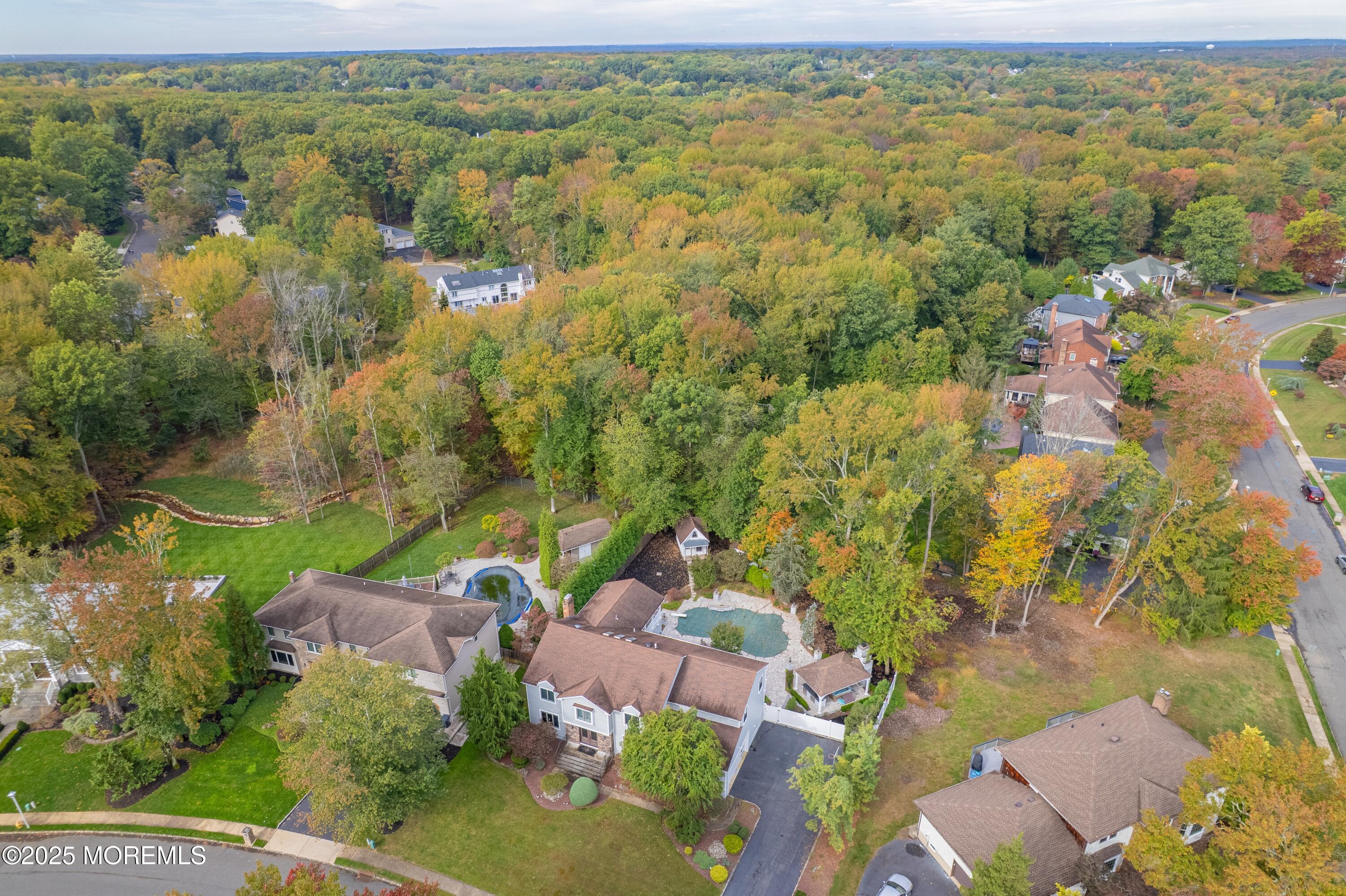 4 Garnet Street Morganville, NJ 07751 - Photo 60 of 70 an aerial view of residential houses with outdoor space