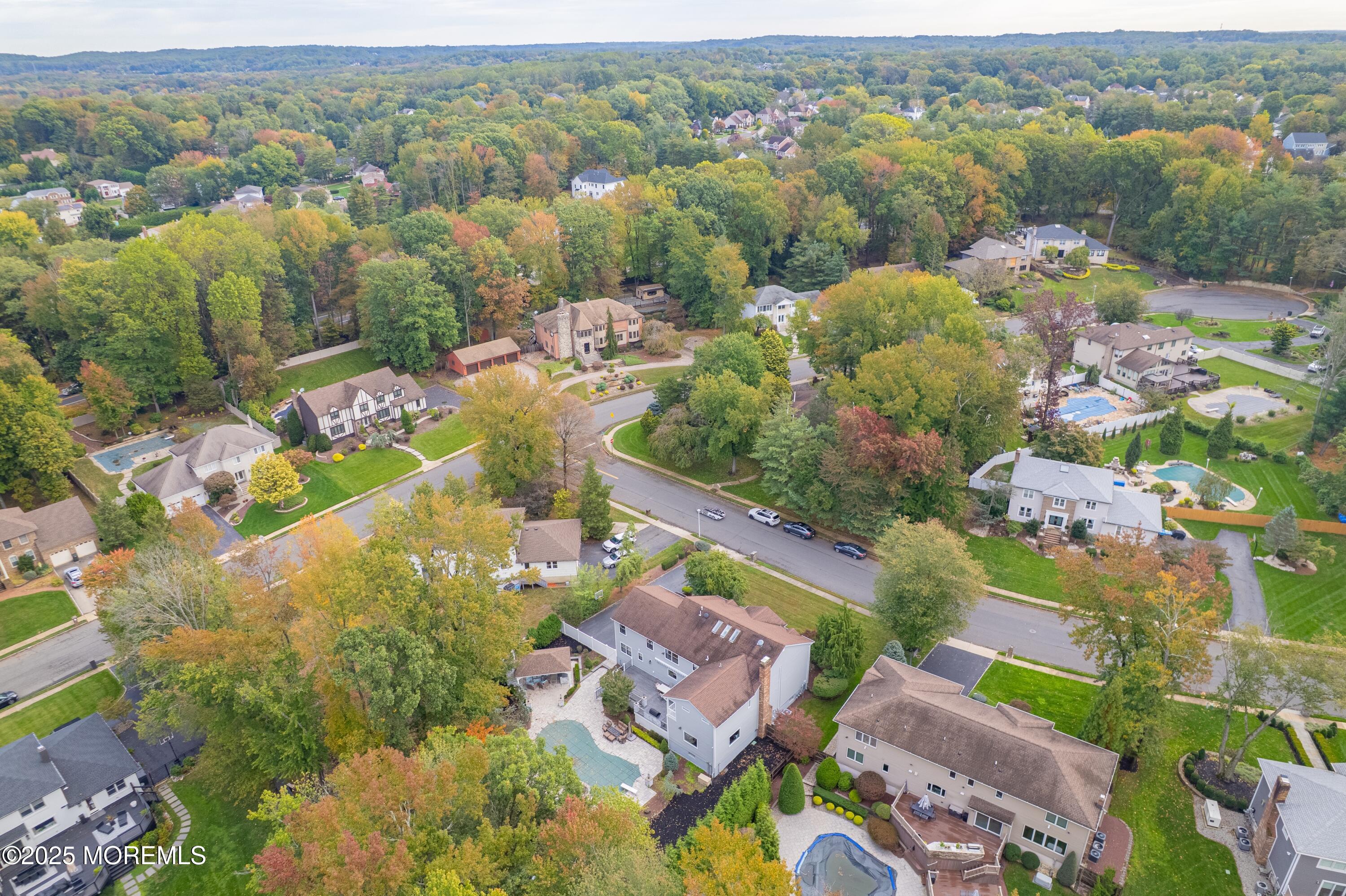 4 Garnet Street Morganville, NJ 07751 - Photo 62 of 70 an aerial view of a city with lots of residential buildings