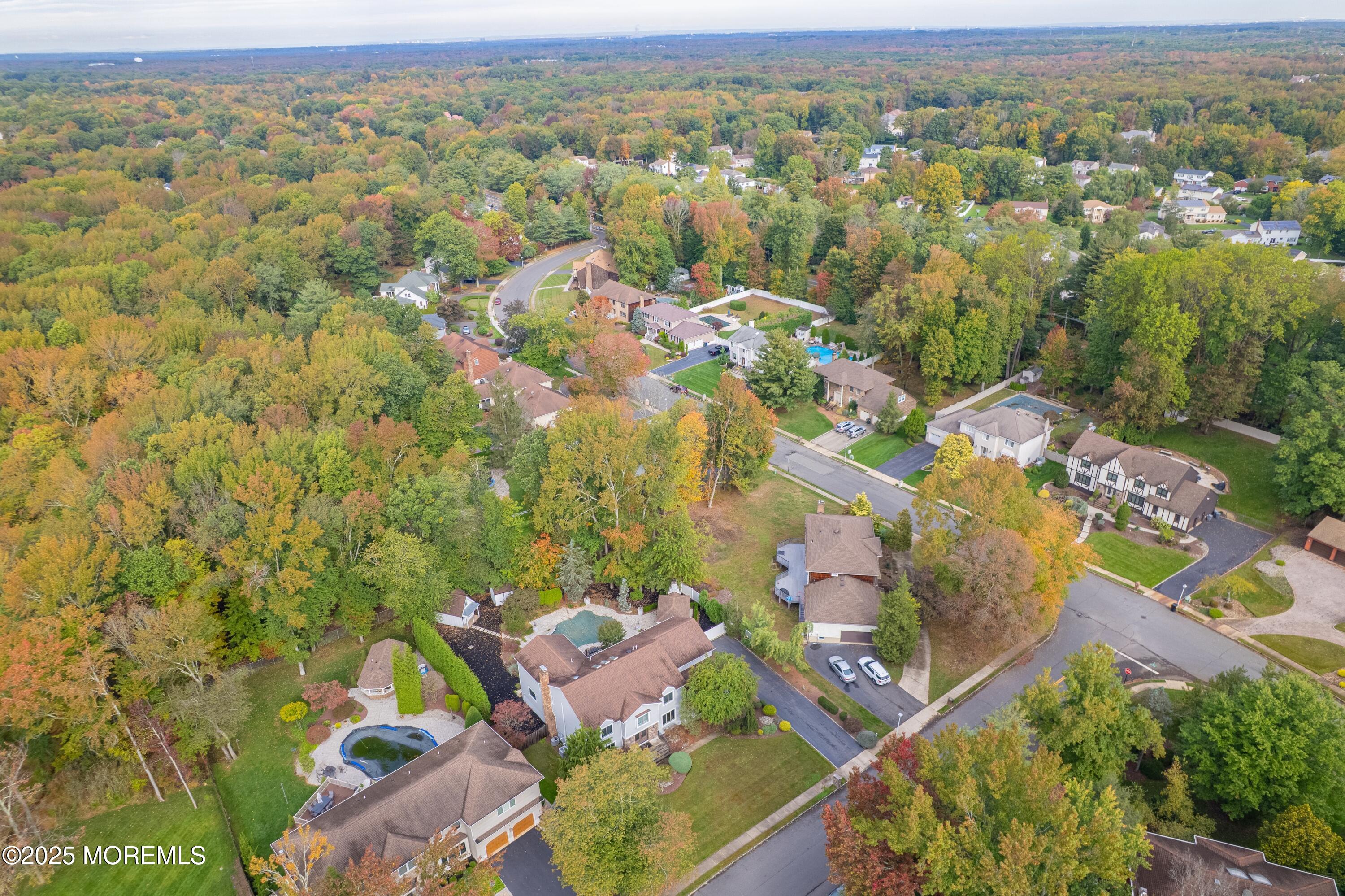 4 Garnet Street Morganville, NJ 07751 - Photo 63 of 70 an aerial view of residential house with parking space