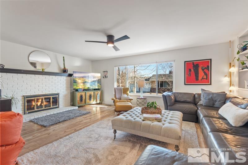 384 Sunset Drive Reno, NV 89509 - Photo 4 of 30 a living room with furniture and a fireplace