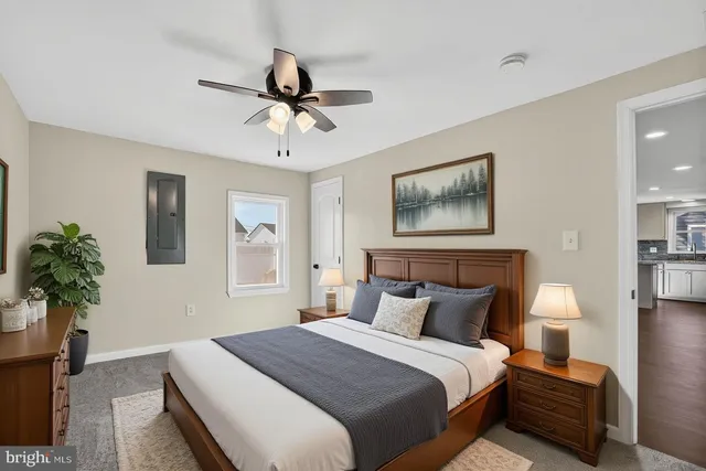 a view of a hallway with entryway to a bedroom
