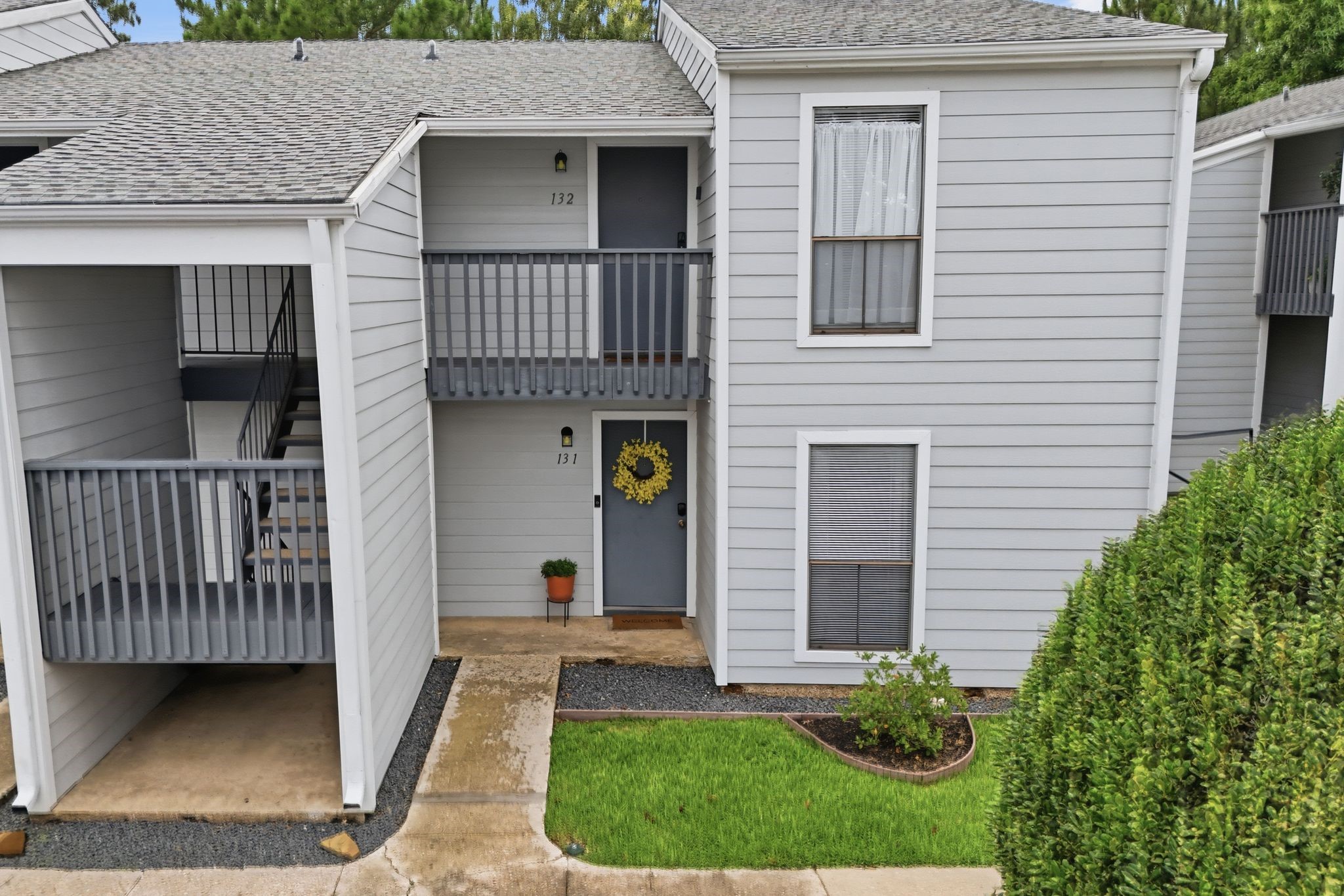 13151 Walden Road, Unit 131 Montgomery, TX 77356 - Photo 24 of 35 Attractive building exterior with mature landscaping and inviting curb appeal.