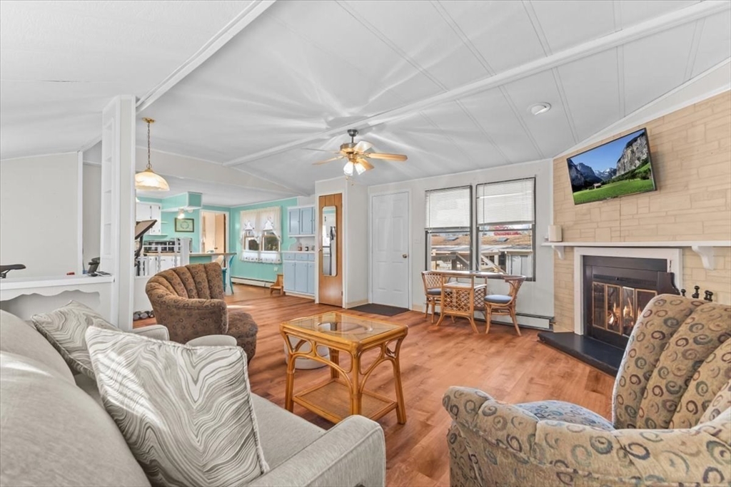 5 Presidents Way Carver, MA 02330 - Photo 13 of 30 a living room with furniture and a fireplace
