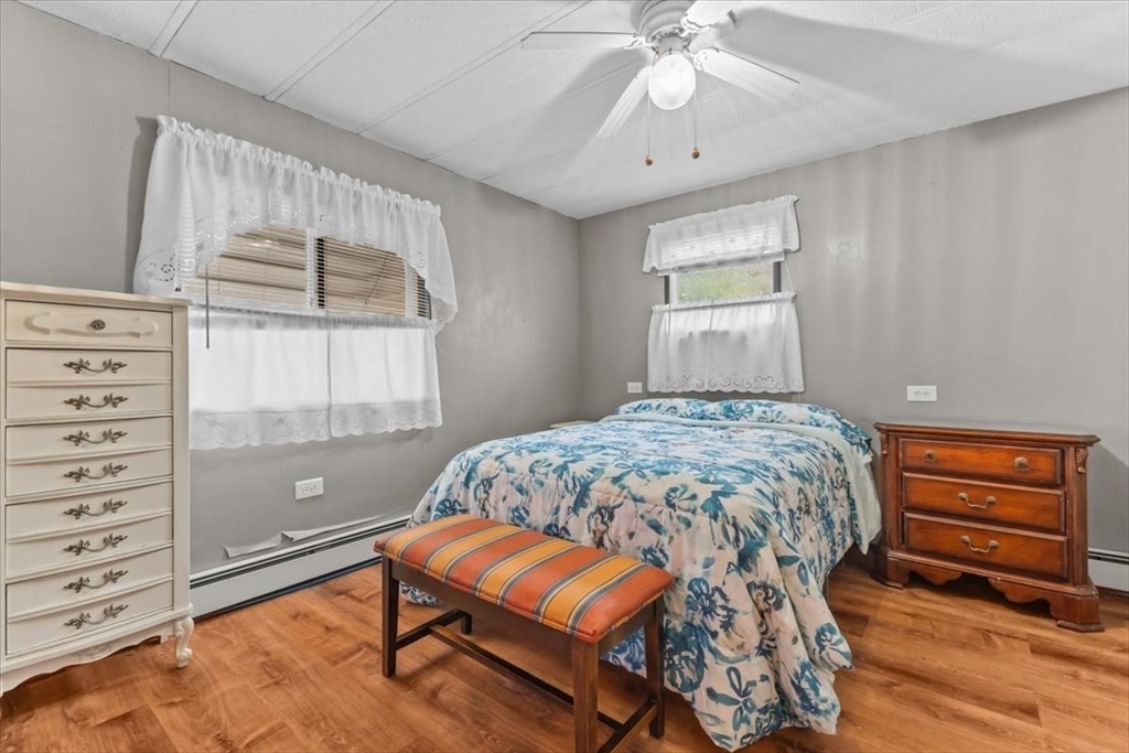 5 Presidents Way Carver, MA 02330 - Photo 19 of 30 a bedroom with a bed and a window
