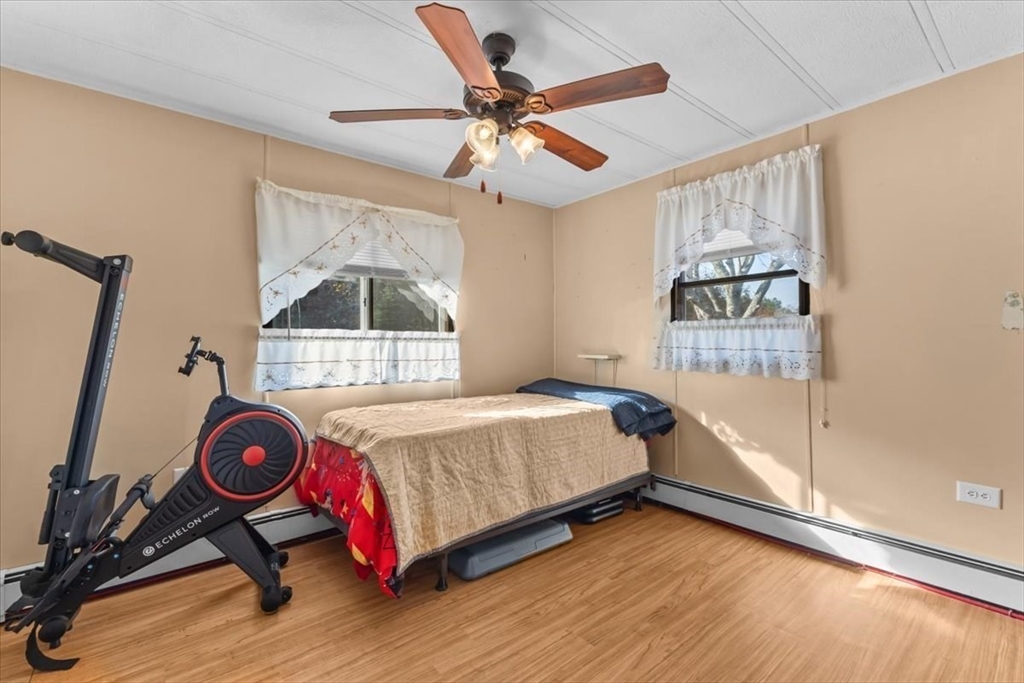 5 Presidents Way Carver, MA 02330 - Photo 20 of 30 a bedroom with a bed and a window