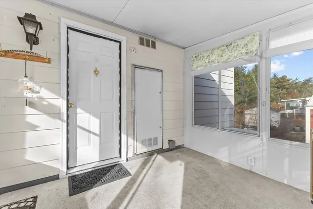 a view of a entrance to other room