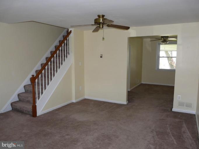 2082 Jasmine Road Dundalk, MD 21222 - Photo 3 of 14 Living Room Dining Room and Stairs