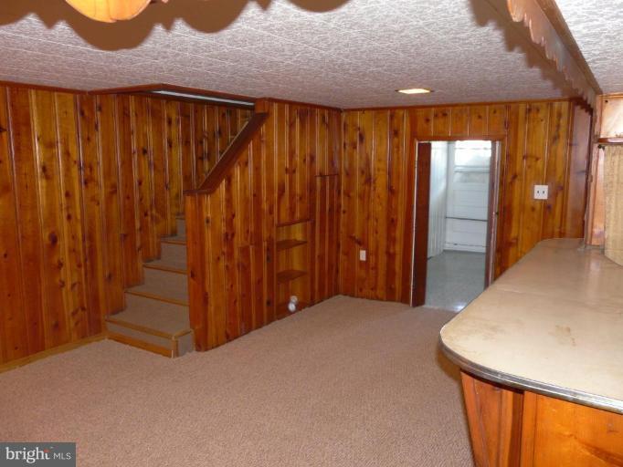 2082 Jasmine Road Dundalk, MD 21222 - Photo 7 of 14 Family Room Stairs and Rear Basement