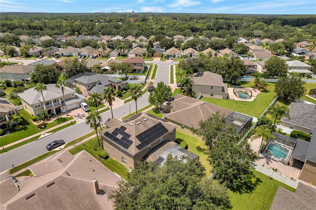 10023 Ians Ridge Road Orlando, FL 32832 - Photo 55 of 60 an aerial view of a house with a yard