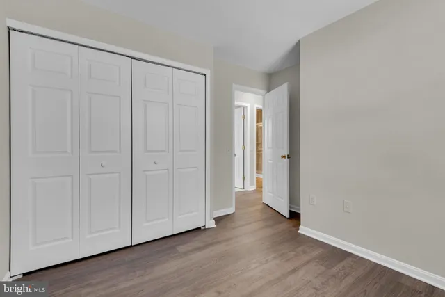 a view of a livingroom with wooden floor