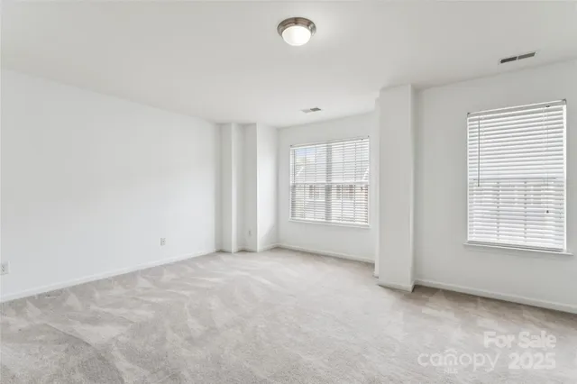 a bathroom with a toilet sink and shower