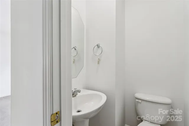 an empty room with kitchen and stove