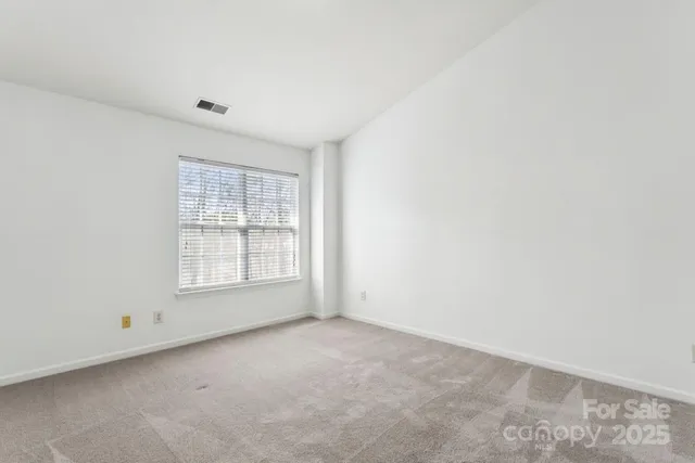 a view of small space with racks on the wall