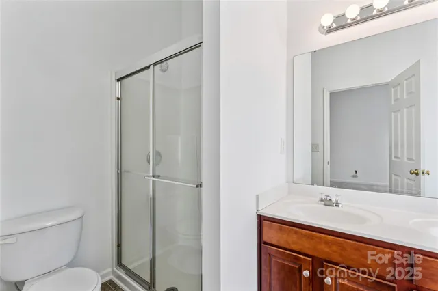 a bath room with a toilet a sink and a bath tub