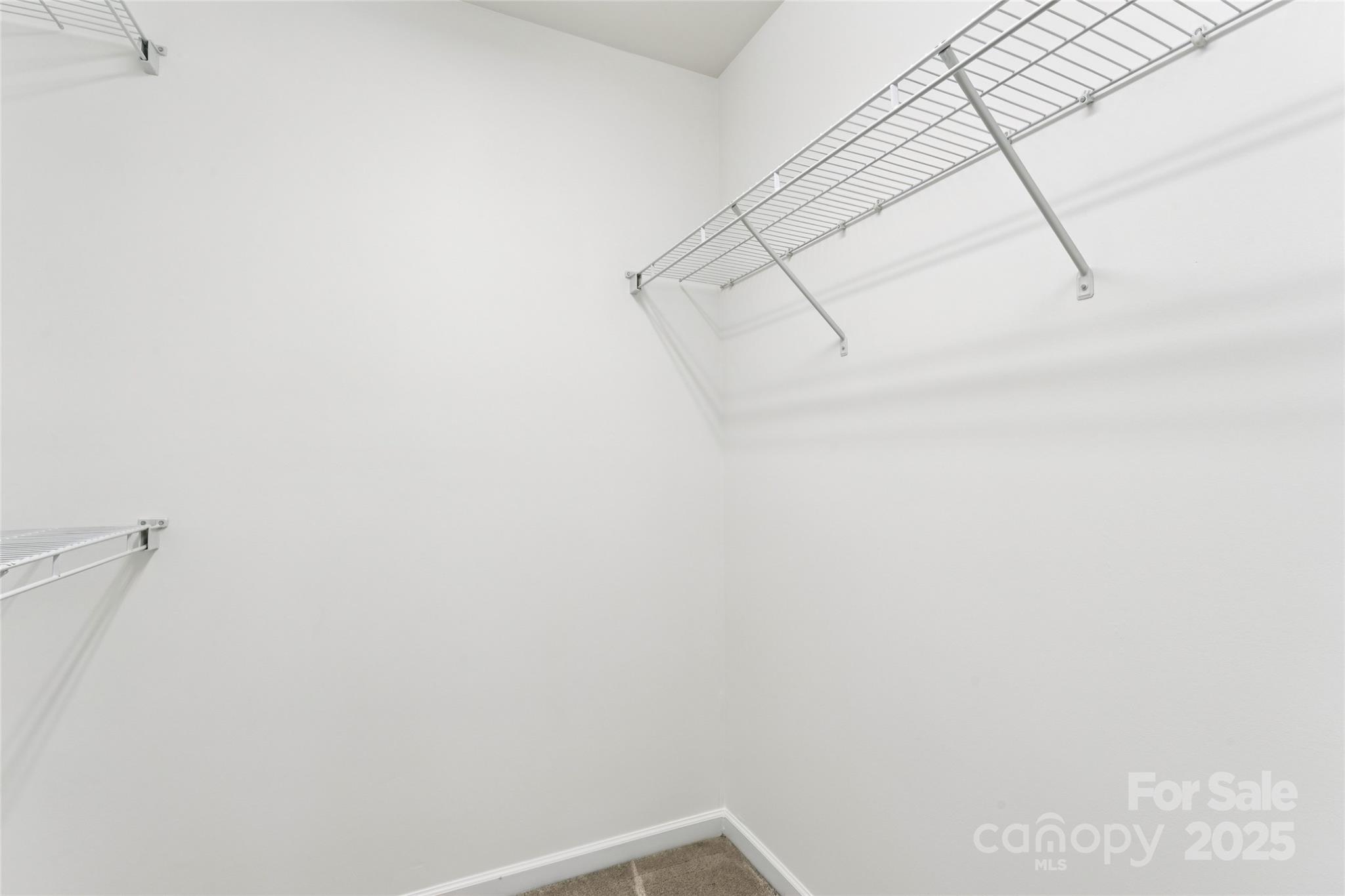 10032 Treeside Lane Matthews, NC 28105 - Photo 34 of 43 a view of small space with racks on the wall