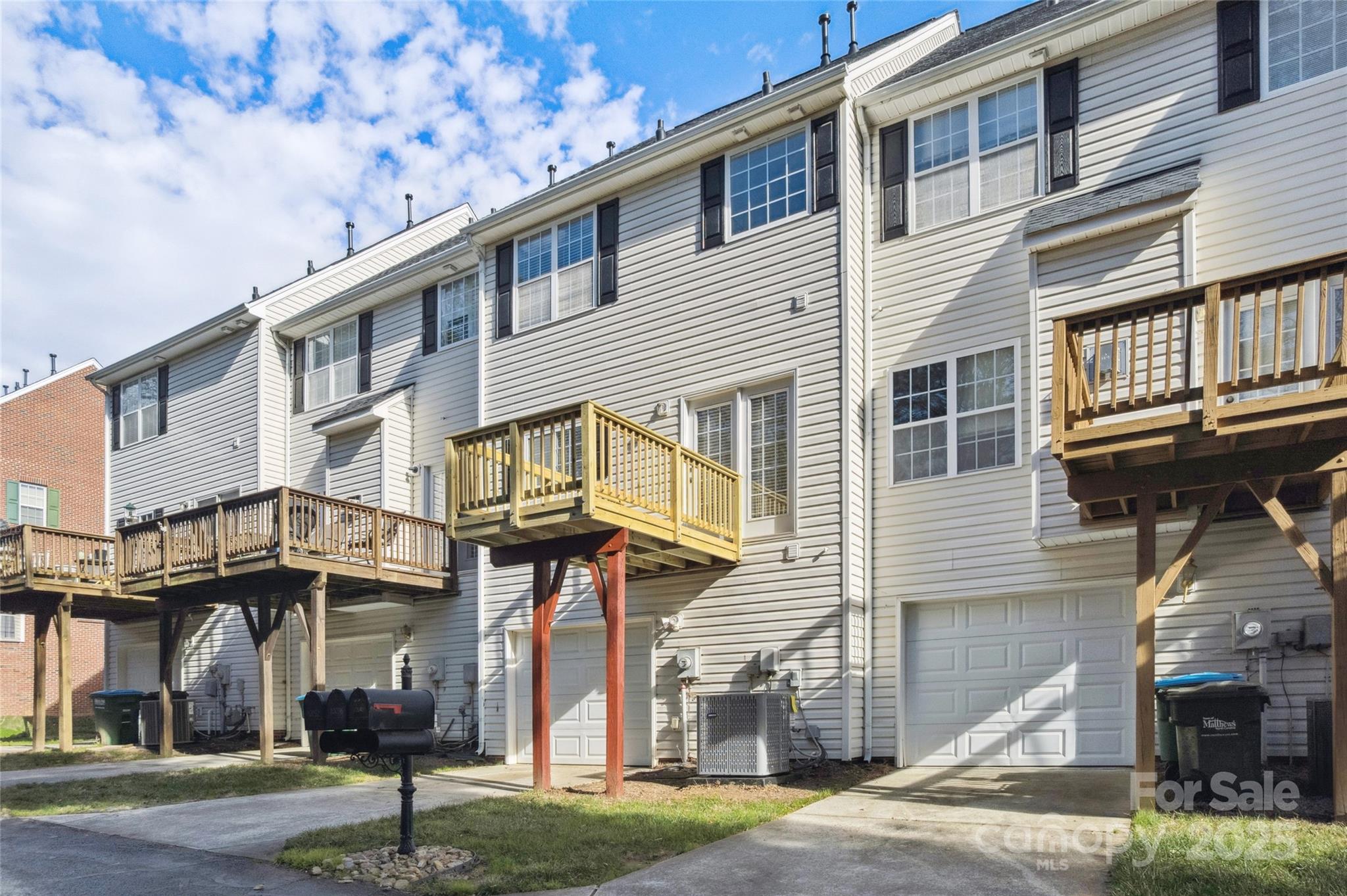 10032 Treeside Lane Matthews, NC 28105 - Photo 39 of 43 a front view of a building with street