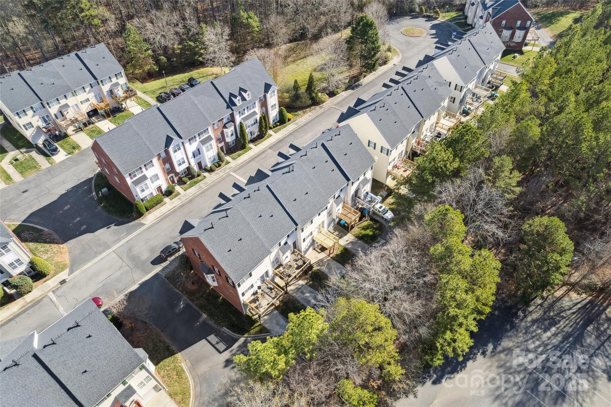 10032 Treeside Lane Matthews, NC 28105 - Photo 40 of 43 an aerial view of a house