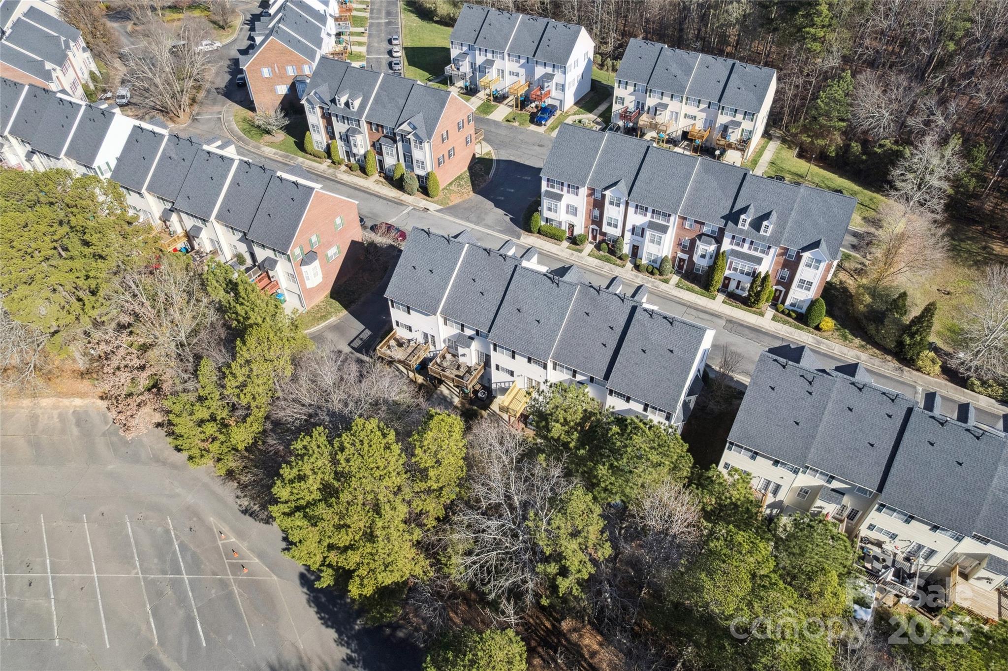10032 Treeside Lane Matthews, NC 28105 - Photo 41 of 43 an aerial view of a house with a yard