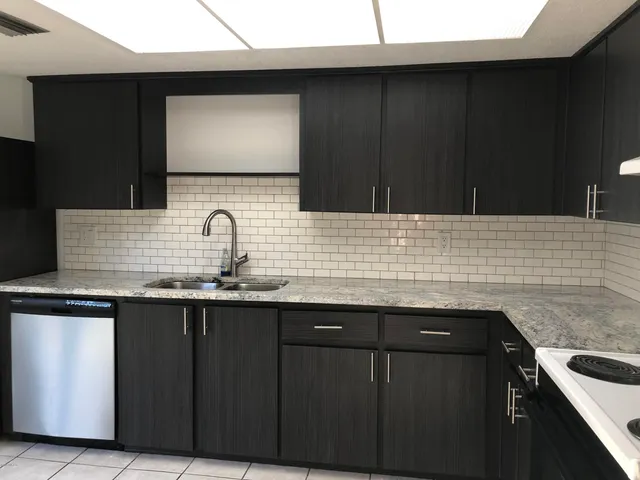 a sink with granite countertop a sink