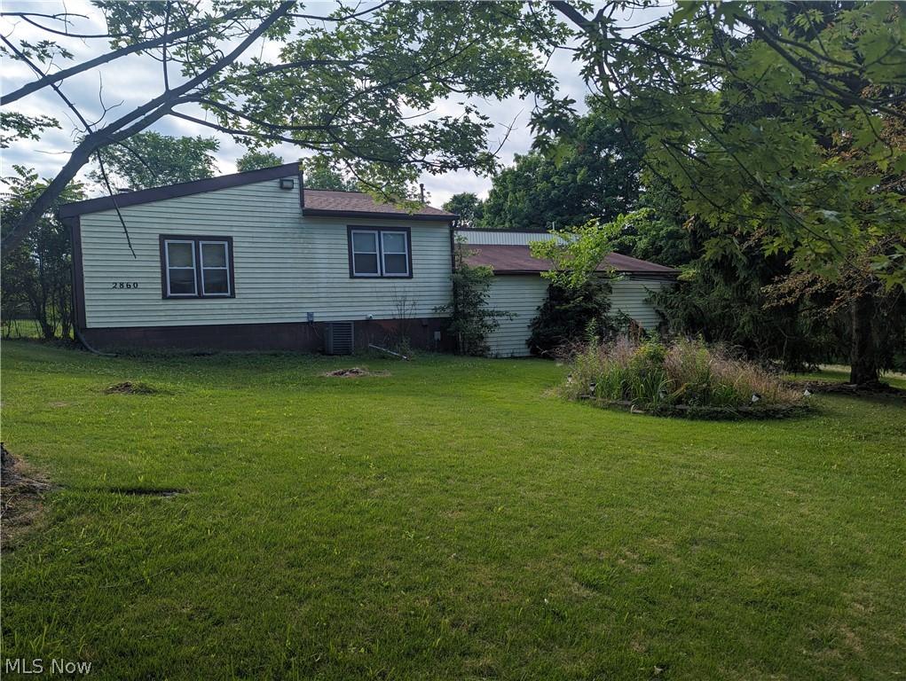 2860 Run-A-Round Road Junction City, OH 43748 - Photo 2 of 22 View of yard featuring central air condition unit
