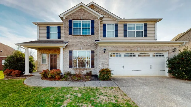 front view of house with a yard