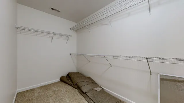 a view of a room with racks on the wall