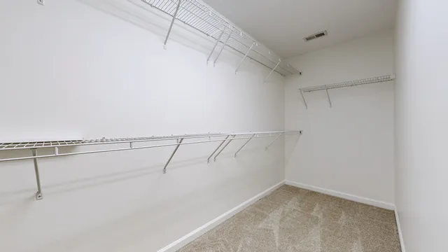 a view of a room with racks on the wall