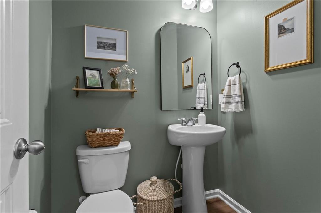 369 Franklin Lane Acworth, GA 30102 - Photo 13 of 27 a bathroom with a toilet sink and mirror