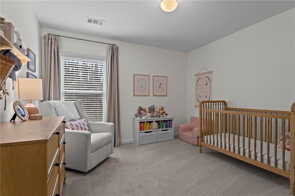 369 Franklin Lane Acworth, GA 30102 - Photo 23 of 27 a bedroom with furniture and a large window