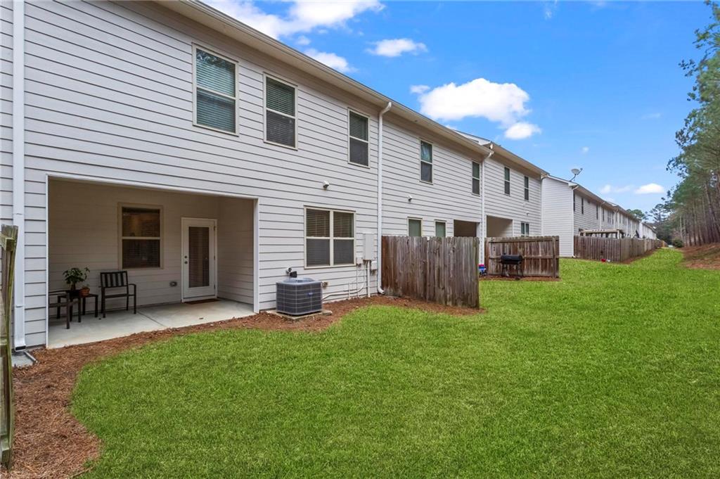 369 Franklin Lane Acworth, GA 30102 - Photo 26 of 27 a view of a house with a backyard and sitting area