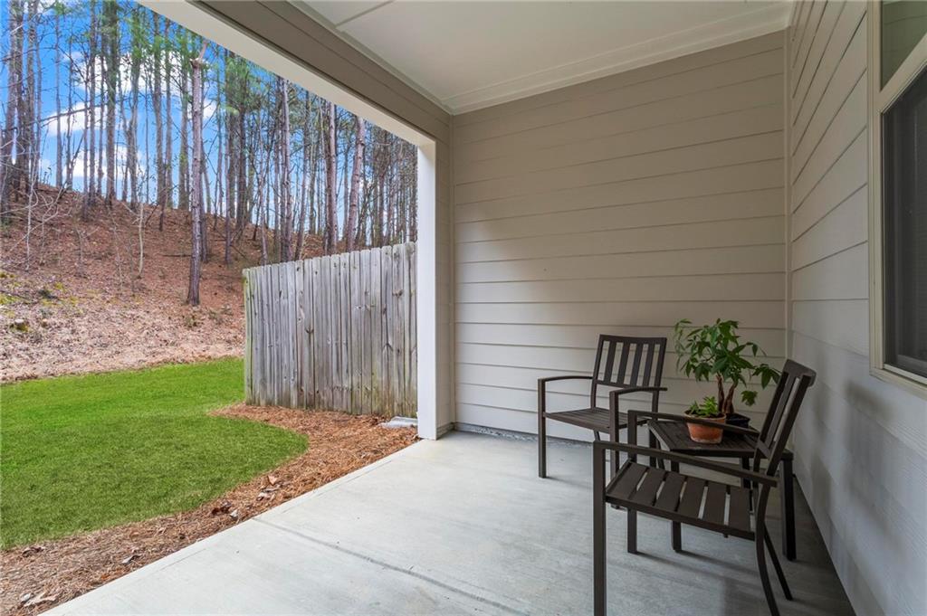 369 Franklin Lane Acworth, GA 30102 - Photo 27 of 27 a view of a chairs and table in backyard