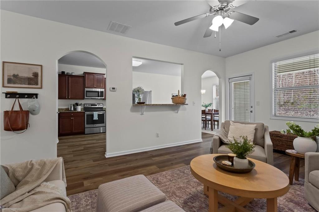 369 Franklin Lane Acworth, GA 30102 - Photo 8 of 27 a living room with furniture and kitchen view