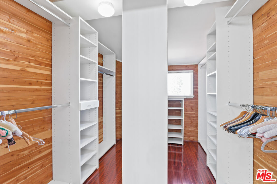 3851 Olympiad Drive View Park, CA 90043 - Photo 27 of 35 a view of walk in closet with empty racks