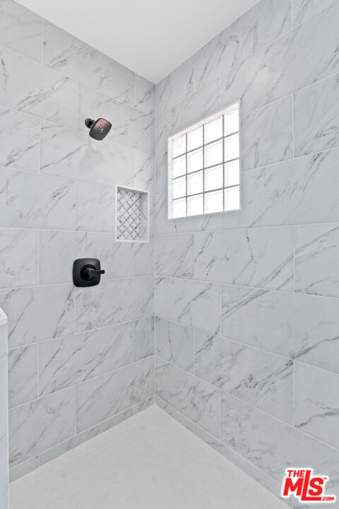 3851 Olympiad Drive View Park, CA 90043 - Photo 30 of 35 a bathroom with shower