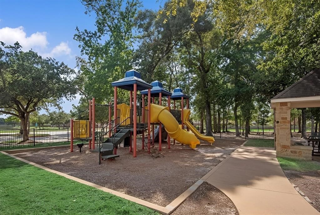 29819 South Legends Village Circle Spring, TX 77386 - Photo 5 of 48 a view of outdoor space with playground and green space