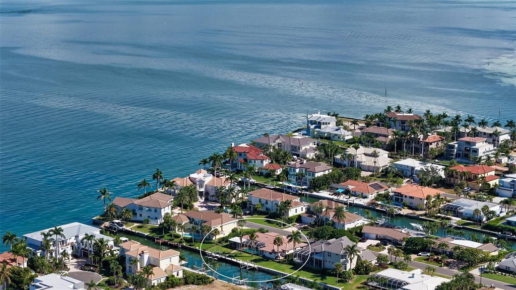 595 Bowsprit Lane Longboat Key, FL 34228 - Photo 26 of 31 an aerial view of a house with a yard