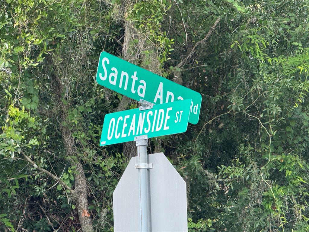 Oceanside St Port North Port, FL 34286 - Photo 3 of 11 a street sign that is on a pole