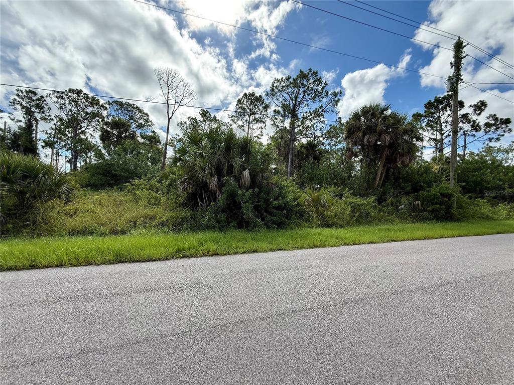 Oceanside St Port North Port, FL 34286 - Photo 10 of 11 a view of outdoor space and yard
