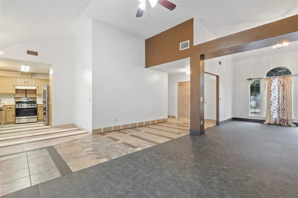 a view of a hallway with staircase