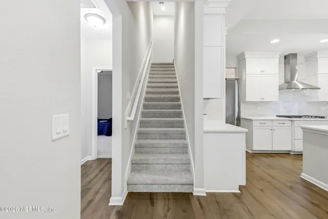 a bed room with a bed and a television