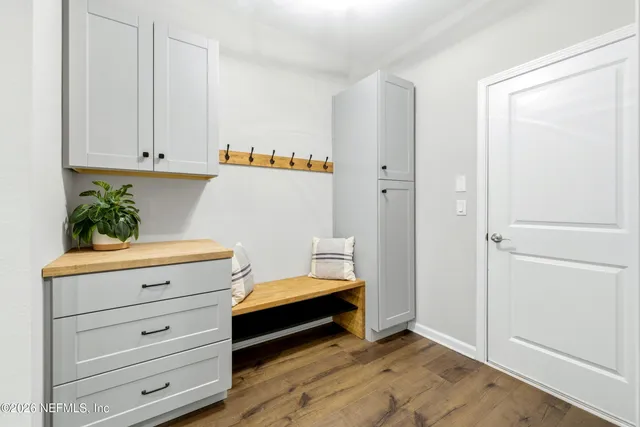 a outdoor living space with furniture and a flat screen tv