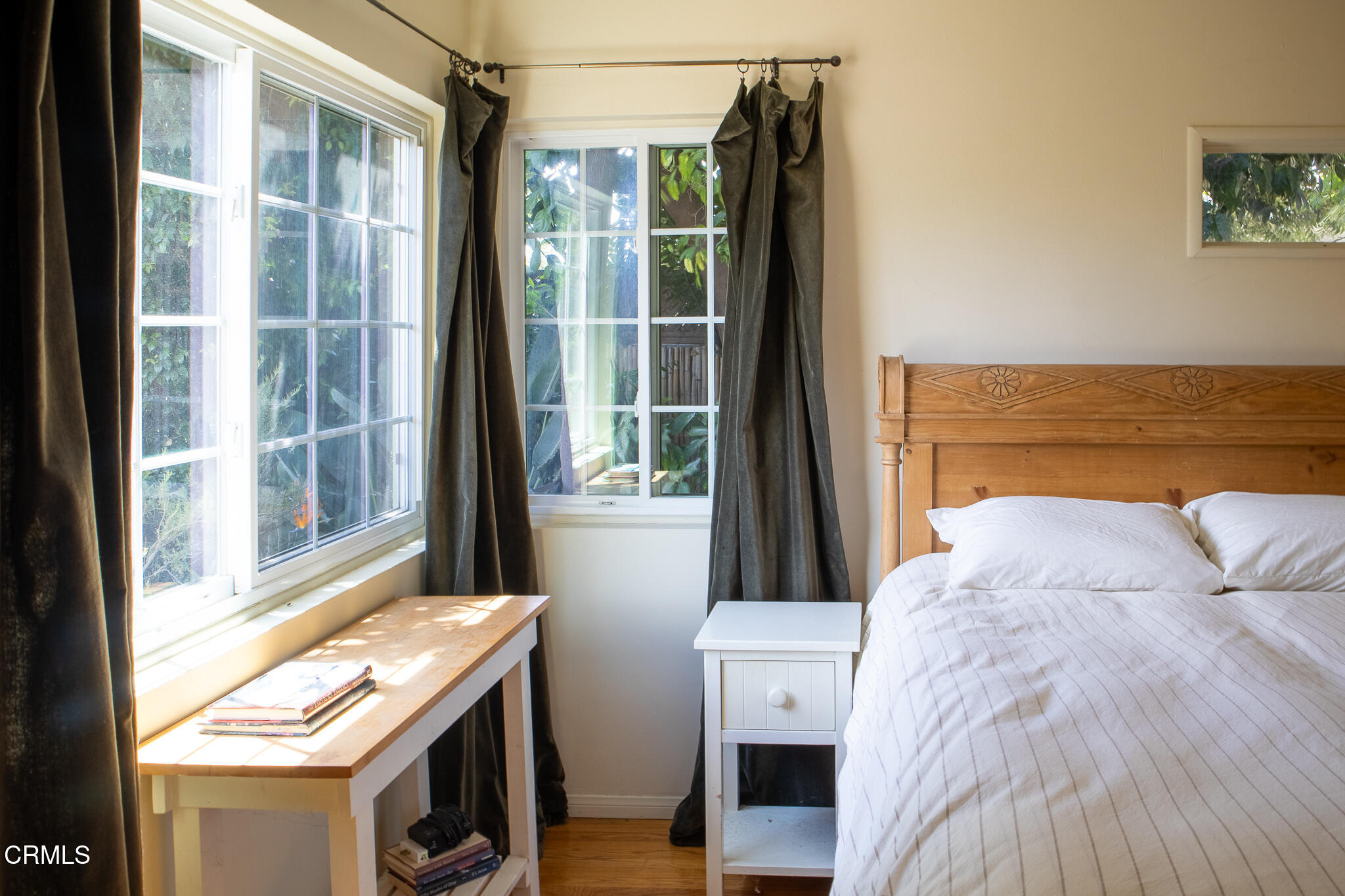 14135 Hatteras Street Sherman Oaks, CA 91401 - Photo 11 of 39 a bed room with a bed and a window