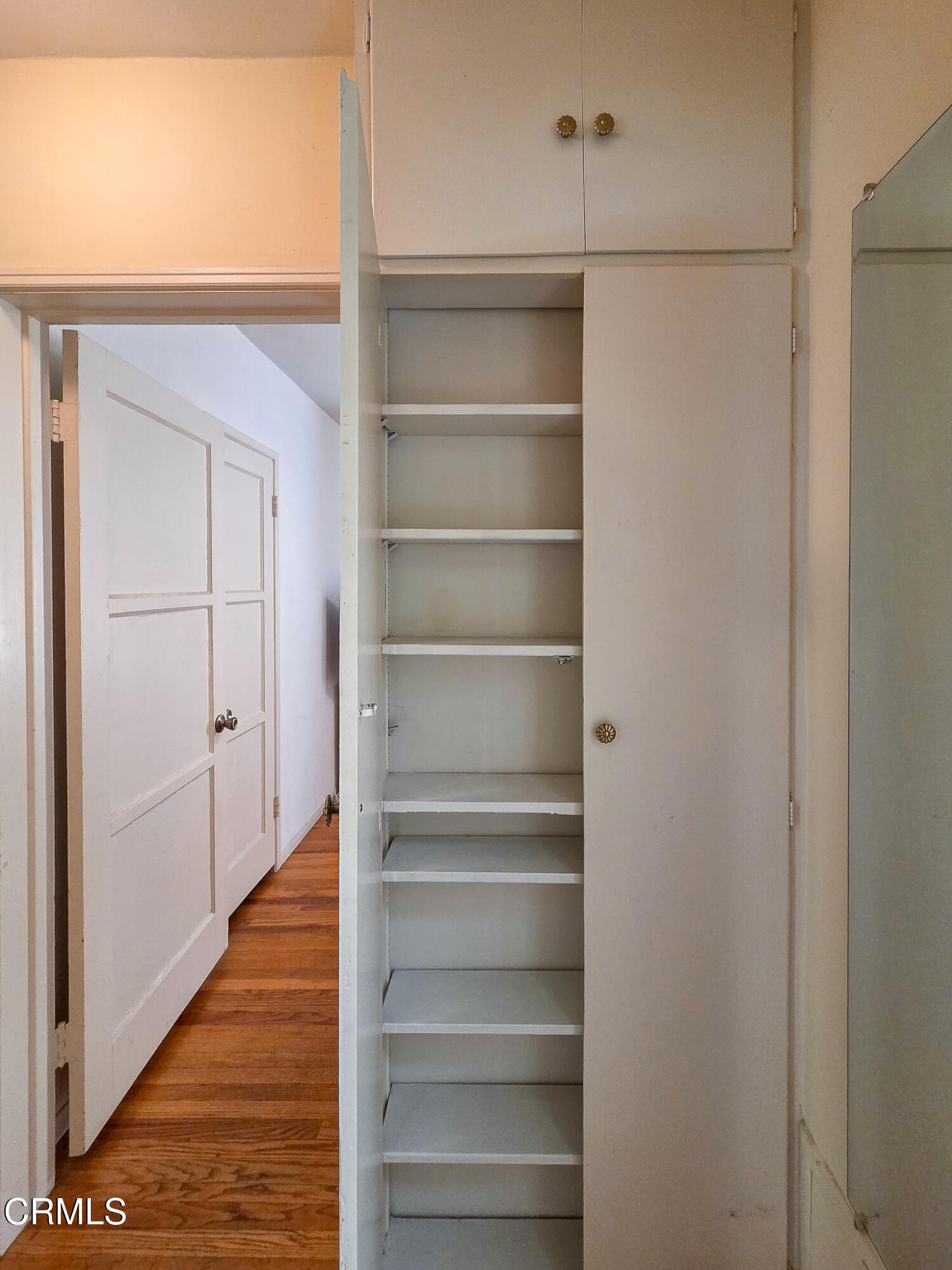 14135 Hatteras Street Sherman Oaks, CA 91401 - Photo 28 of 39 a view of walk in closet with empty racks