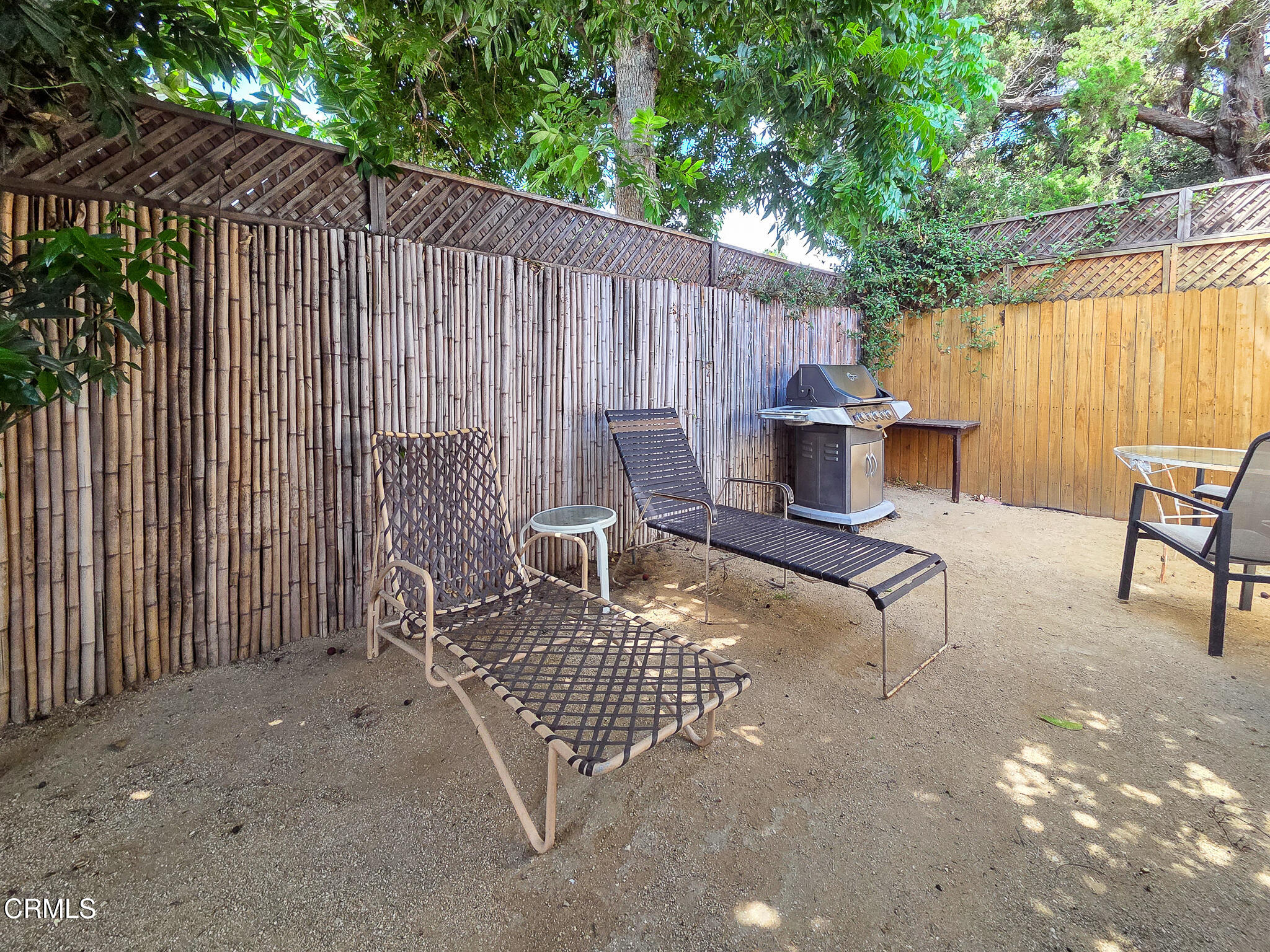 14135 Hatteras Street Sherman Oaks, CA 91401 - Photo 6 of 39 a view of a patio with a table and chairs