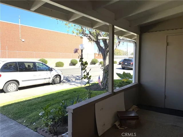 a view of a car in front of a house