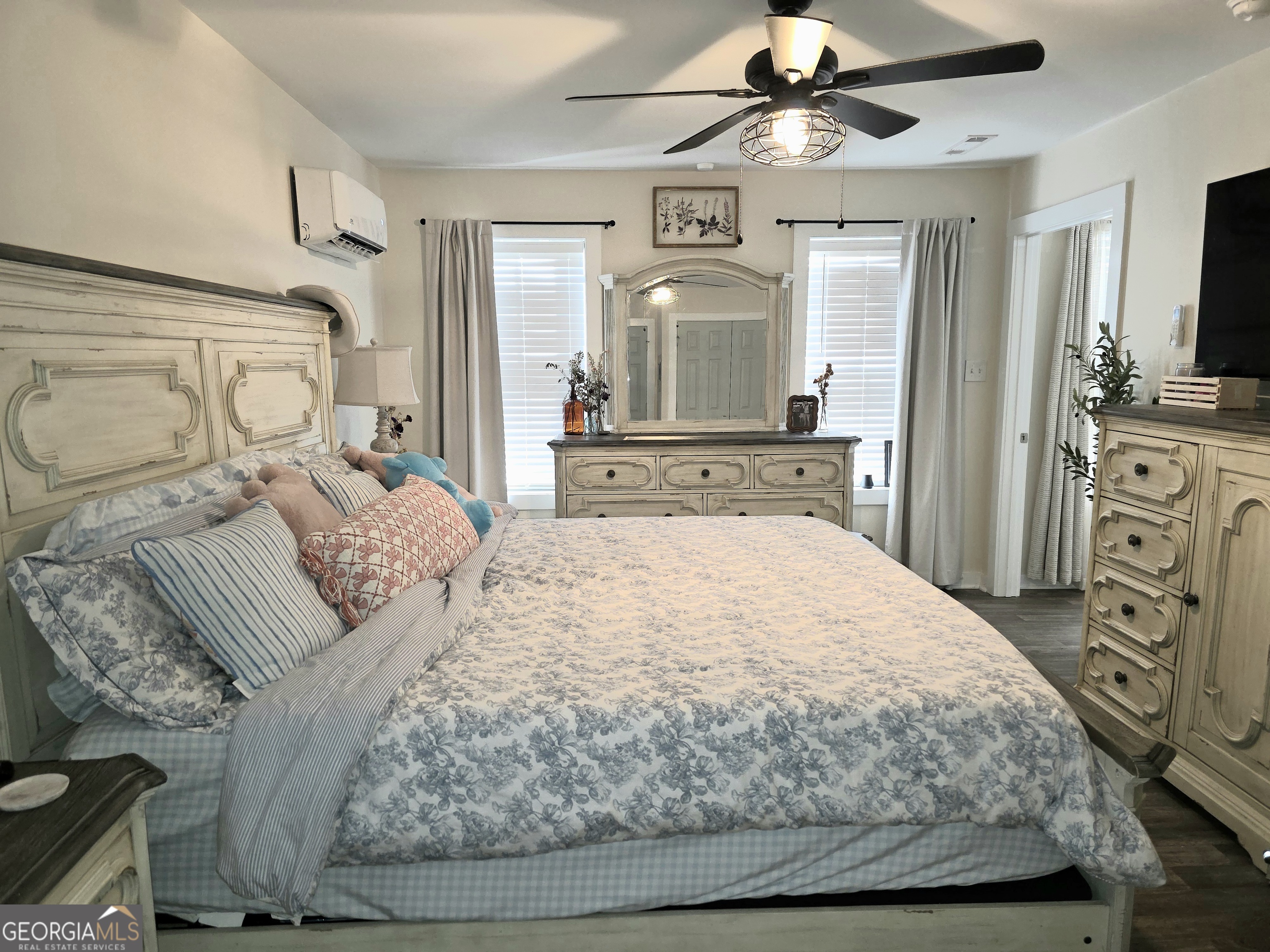 3060 Eatonton Road Madison, GA 30650 - Photo 45 of 65 a bedroom with a bed and ceiling fan