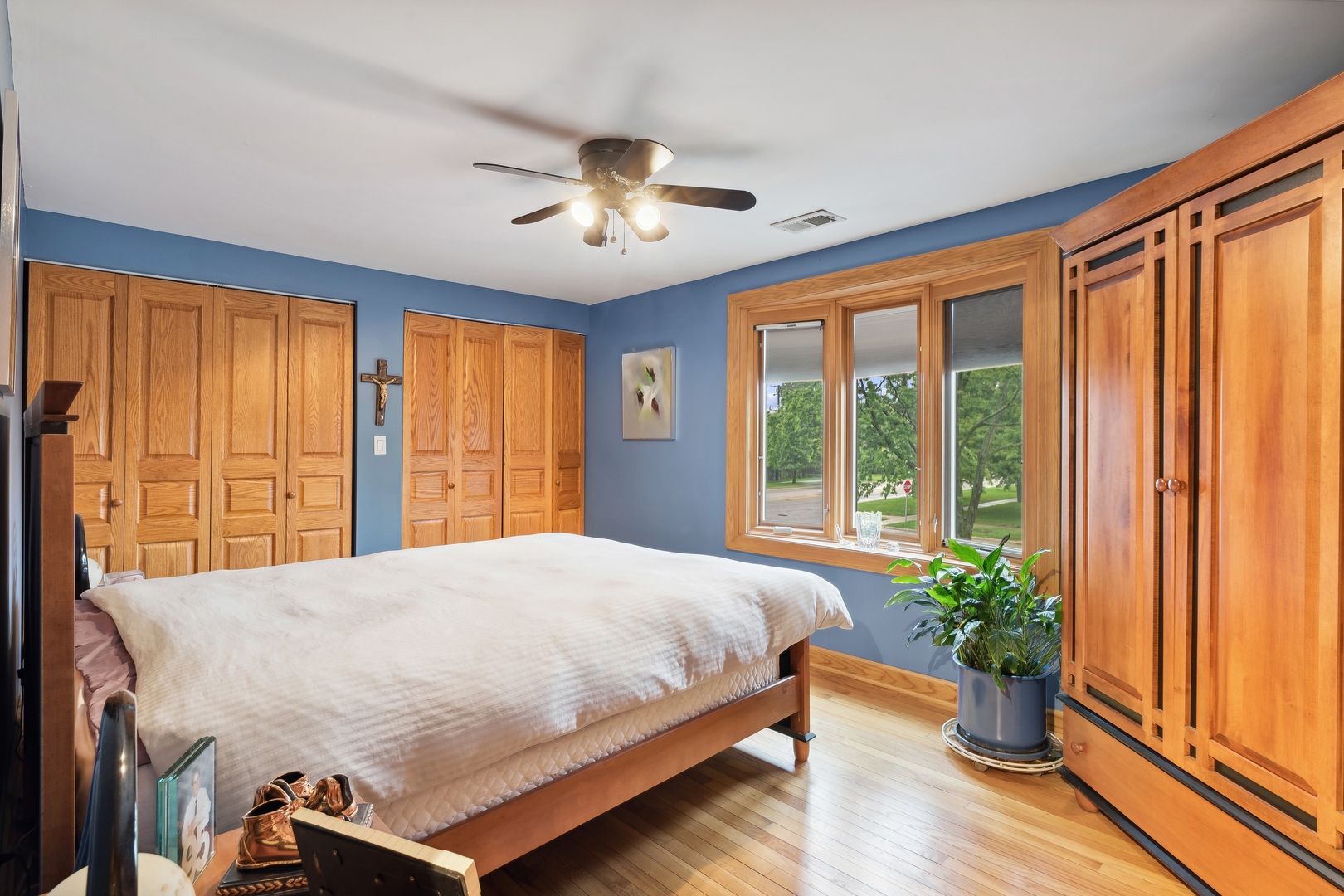 3731 Winnetka Road Glenview, IL 60026 - Photo 15 of 26 a bedroom with a bed and large windows