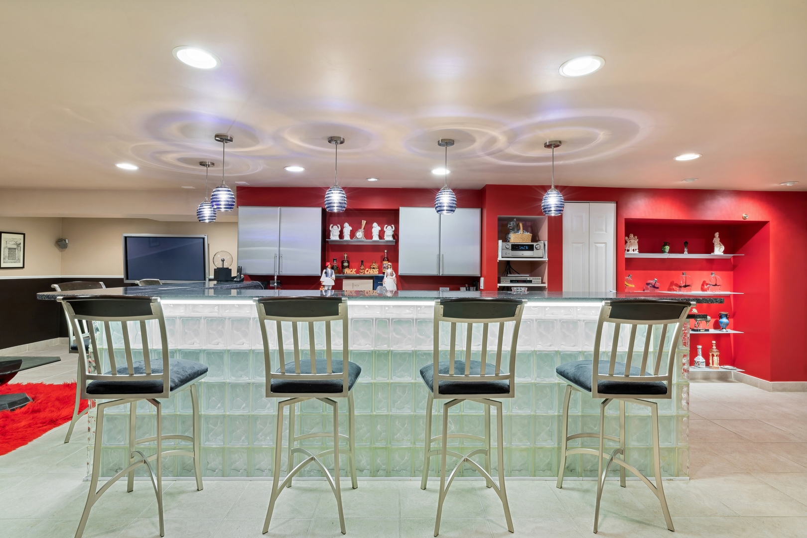 3731 Winnetka Road Glenview, IL 60026 - Photo 20 of 26 a kitchen with stainless steel appliances kitchen island granite countertop a dining table chairs and a refrigerator
