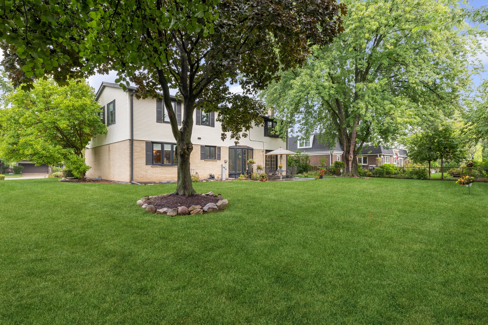 3731 Winnetka Road Glenview, IL 60026 - Photo 22 of 26 a front view of a house with garden