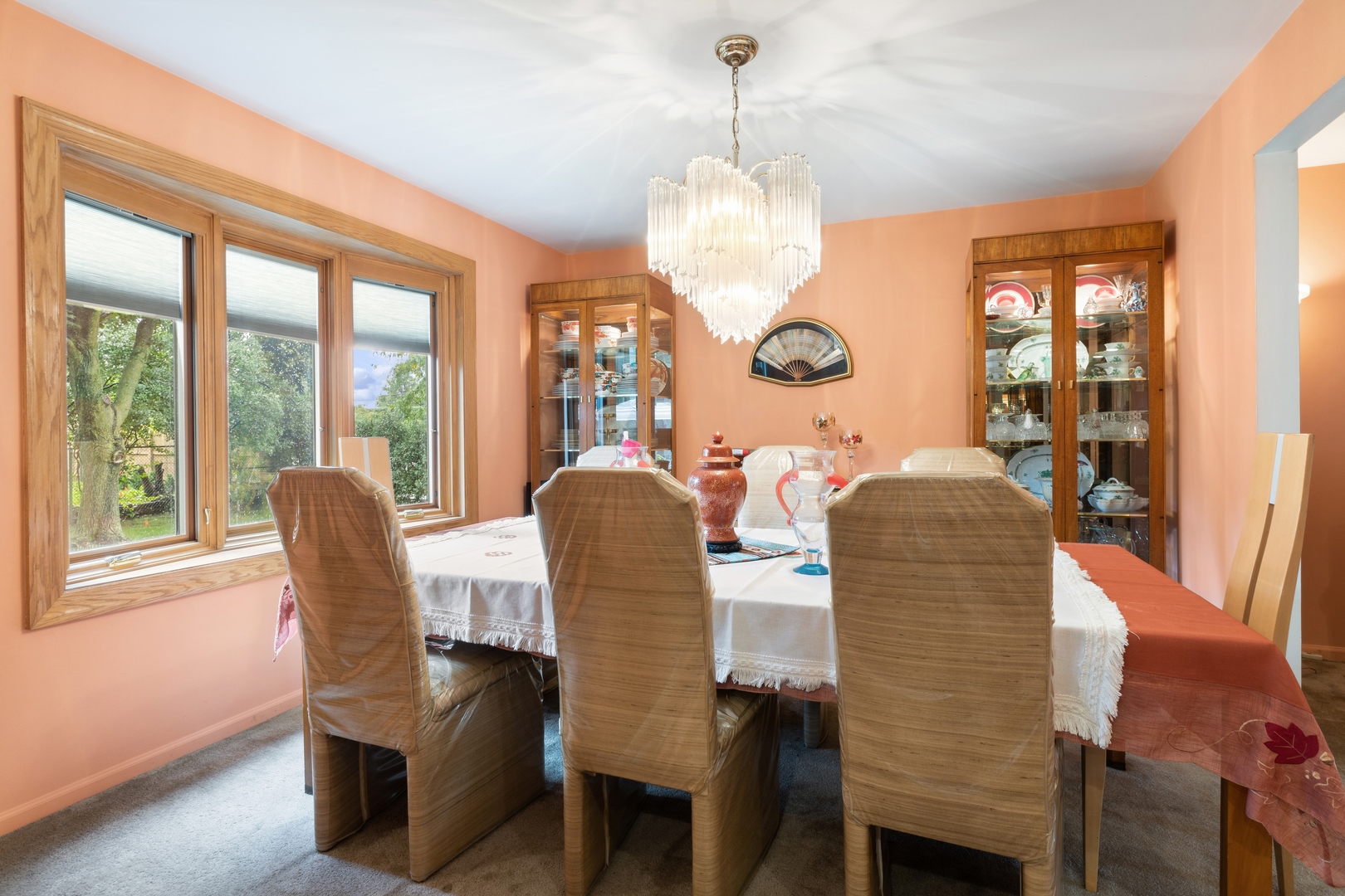 3731 Winnetka Road Glenview, IL 60026 - Photo 6 of 26 a dining room with furniture a chandelier and window